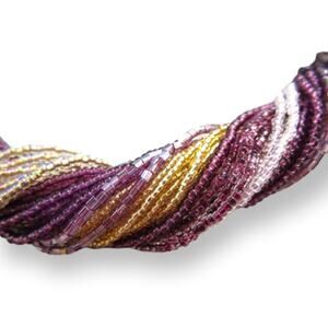 Gorgeous purple and champagne tone multi-strand seed bead necklace
